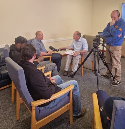 Photo of Zsolt giving feedback to the BBC.